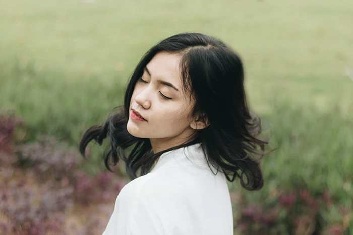 A person with their eyes closed 