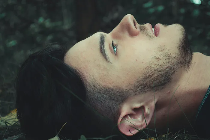 A person lying on the grass 