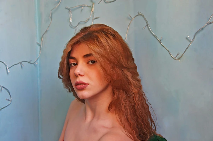 A person with brownish-red hair