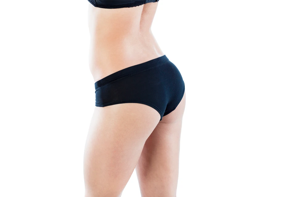 woman in a swimsuit showcasing a toned abdomen