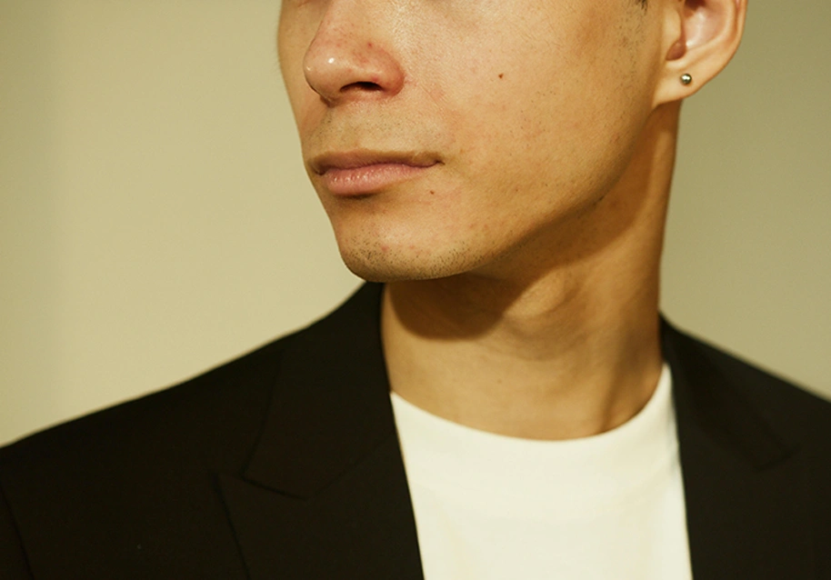 A person in a black suit