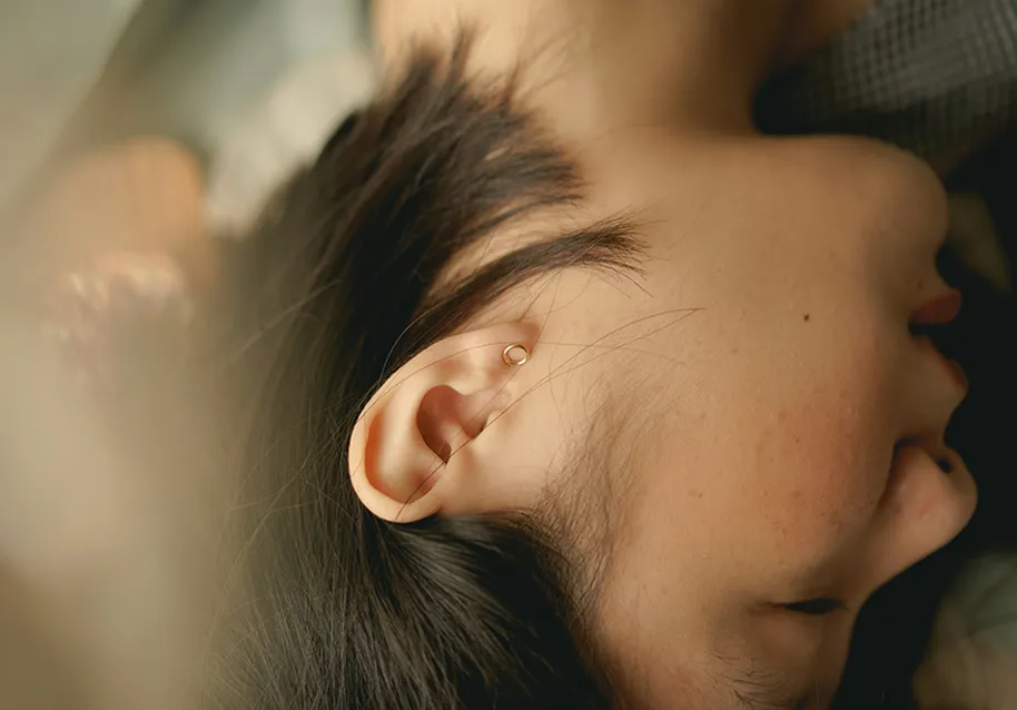 Close-up of a person’s side profile