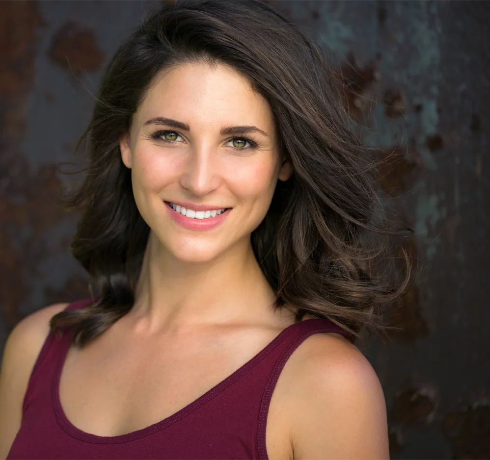 Smiling woman with a refined chin and jawline